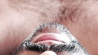 In bed massaging my brown cock