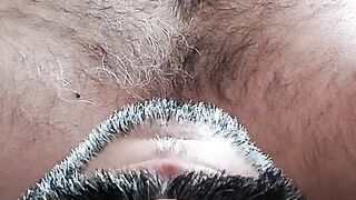 In bed massaging my brown cock