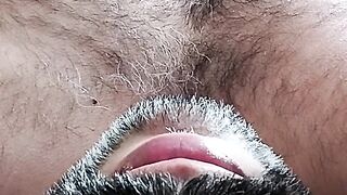 In bed massaging my brown cock