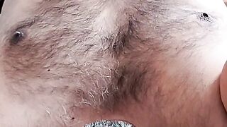 In bed massaging my brown cock